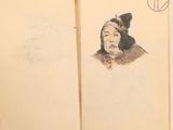 an open book with a drawing of a man in a hat