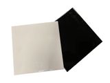 a black and white photo of two sheets of paper on a white background