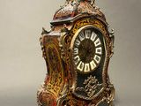 a clock that is sitting on top of a table
