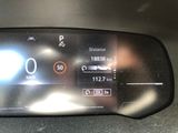 the dashboard of a car with a digital display showing the speed of the car