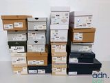 several boxes are stacked on top of each other on a table