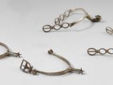 three pairs of silver ear cuffs and a pair of silver ear cuffs
