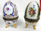 two eggs are sitting next to each other on a white surface