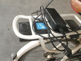 a bicycle with a basket on the back of it