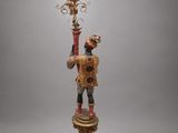 an image of a lamp that is on a stand with a lamp