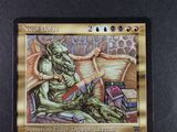 a close up of a card with a picture of a dragon on it