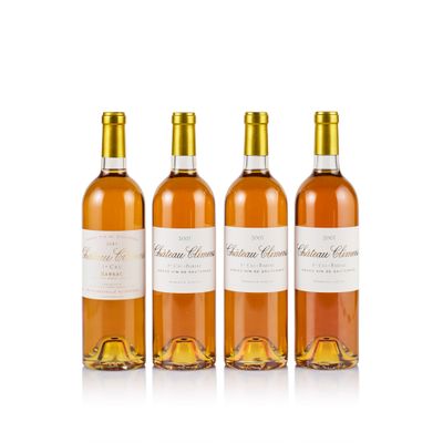 three bottles of wine sitting next to each other on a white surface