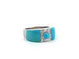 a close up of a ring on a white background