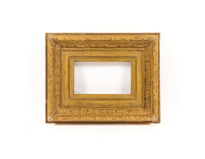an old gold picture frame on a white background