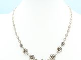a white mannequin necklace on a mannequin mannequin mannequin mannequin mannequin mannequin mannequin mannequin