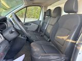 the interior of a van with black leather seats and a steering wheel