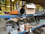 many different types of tools on a shelf in a warehouse
