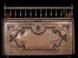 a wooden box with a decorative design on it
