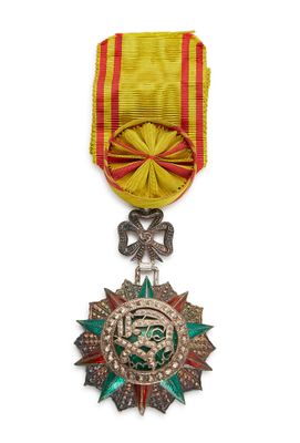 une image représentant une médaille ornée d'un ruban et d'une étoile
