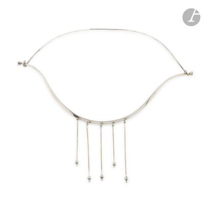 silver plated necklace with dangling beads on a white background