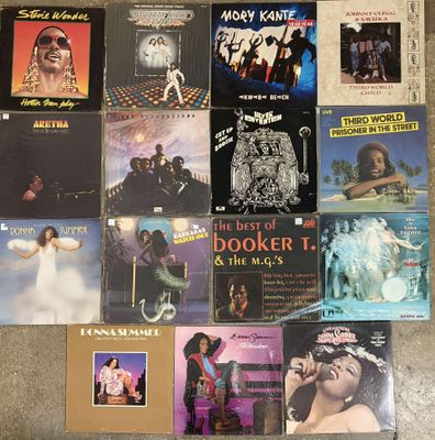 a lot of music cds on the floor together