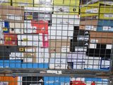 a metal cage filled with lots of different types of boxes