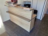 a picture of a reception desk in a home office