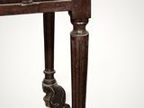 an old wooden table with a drawer on top of it