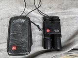 a black case that has a pair of binoculars in it