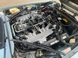 a small engine in the engine bay of a car