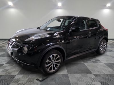 2018 nissan juke suv in a showroom with a checkered floor