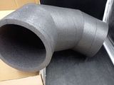a large pipe that is sitting in the back of a truck