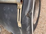 a close up of a tire on the side of a truck
