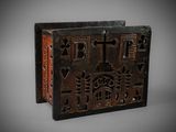 an old wooden box with carvings and carvings on it