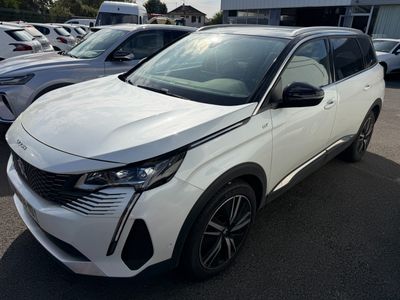 the white toyota c - hr is parked in a lot with other cars in the background
