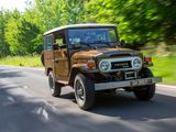 a brown jeep that is driving down the road