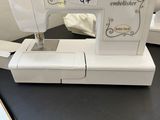 an image of a sewing machine sitting on top of a table