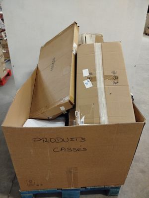 a box full of boxes sitting on a pallet in a warehouse