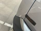 a close up of a car with a sticker on it