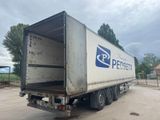 a truck that is sitting in the dirt