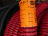 a red hose with a yellow tube attached to it