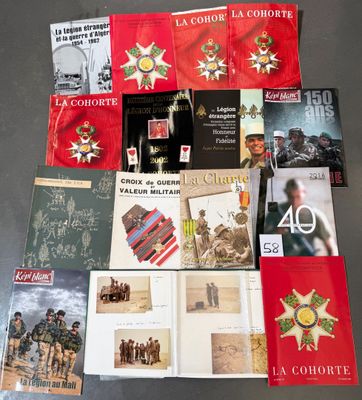 a lot of books and pamphlets on the table