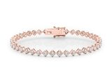 a rose gold bracelet with diamonds on a white background