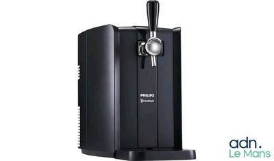 a black beer dispenser sitting on top of a counter