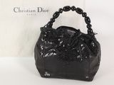 Sac à main Christian Dior en cuir verni noir avec anses en chaîne