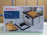 a box of food sitting on a table in a room