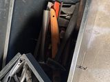 a metal box with tools inside of it in a garage