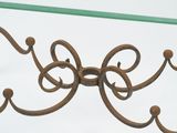 a close up of a metal object on a glass table
