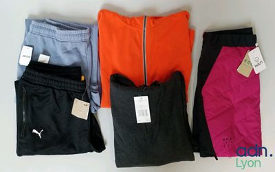 three pairs of women ' s leggings with tags on them