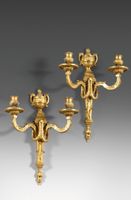 Paire d'appliques en bronze ciselé et doré à deux bras de lu…