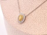 yellow and white diamond heart pendant on a mannequin mannequin mannequin mannequin mannequin mannequin mannequin mannequin