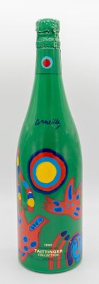 green bottle with red and blue design on it