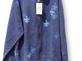 the jacket is blue and has blue flowers on it