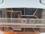a plastic container with a train inside of it