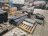 many different types of steel bars in a warehouse